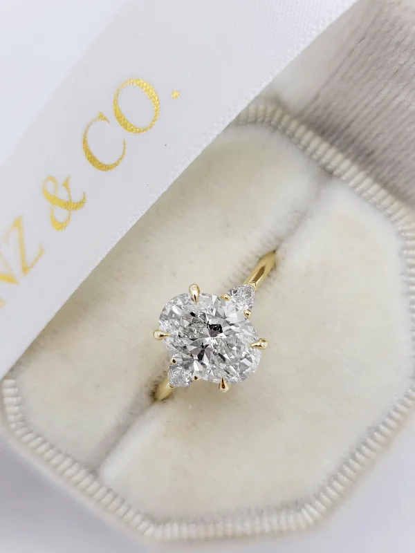 Large Gold Cocktail Rings-2.40 Carats Lab Grown Oval Cut with Pear Shape Side Stones Diamond Engagement Ring in Yellow Gold