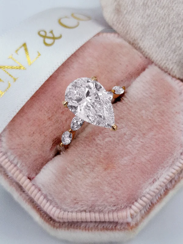 Luxury Platinum Engagement Rings-3.73 Carats Lab Grown Pear Shaped with Marquise Side Stones Hidden Halo Diamond Engagement Ring