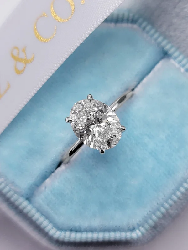 Fashionable Cocktail Rings-2.25 Carats Lab Grown Oval Cut Solitaire Hidden Halo Diamond Engagement Ring